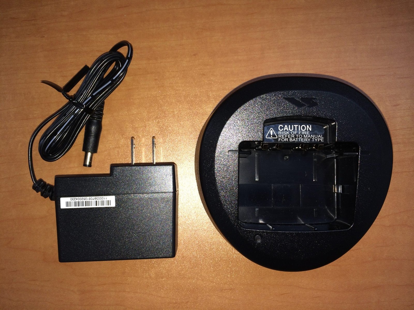 Vertex Standard EVX-539 radio charger and charging stand, showcasing a compact and durable design.