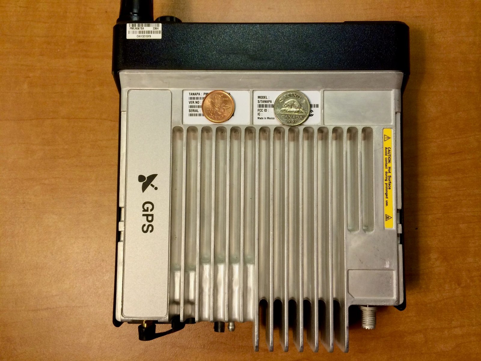 Underside view of the Motorola XPR 5550 heatsink, highlighting its durable design for frequent and demanding use.