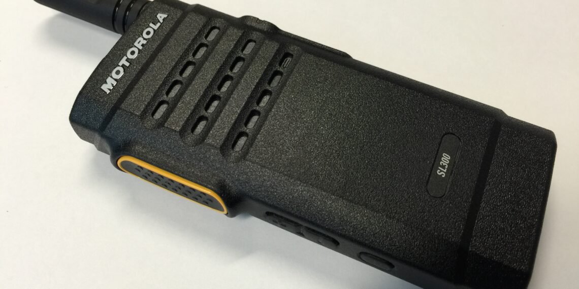 Front view of the Motorola SL300 DMR radio showing its slim design and matrix LED display.