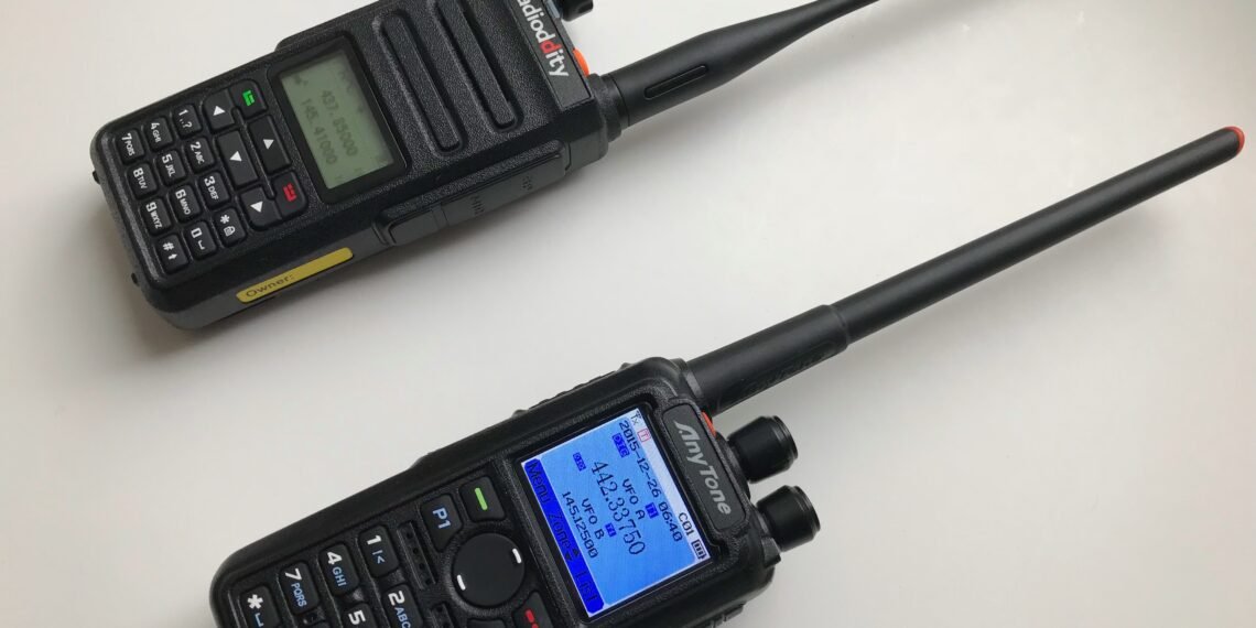 DMR for Beginners - Radioddity GD-77 and AnyTone AT-D878UV handheld radios side-by-side on a white background