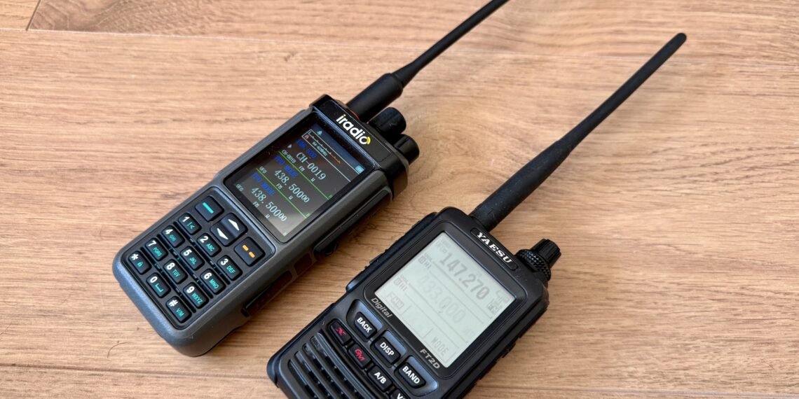 Photo showing Analog vs Digital Voice ham radios: iRadio UV-98Plus analog FM handheld next to a Yaesu FT2D Fusion digital handheld radio.