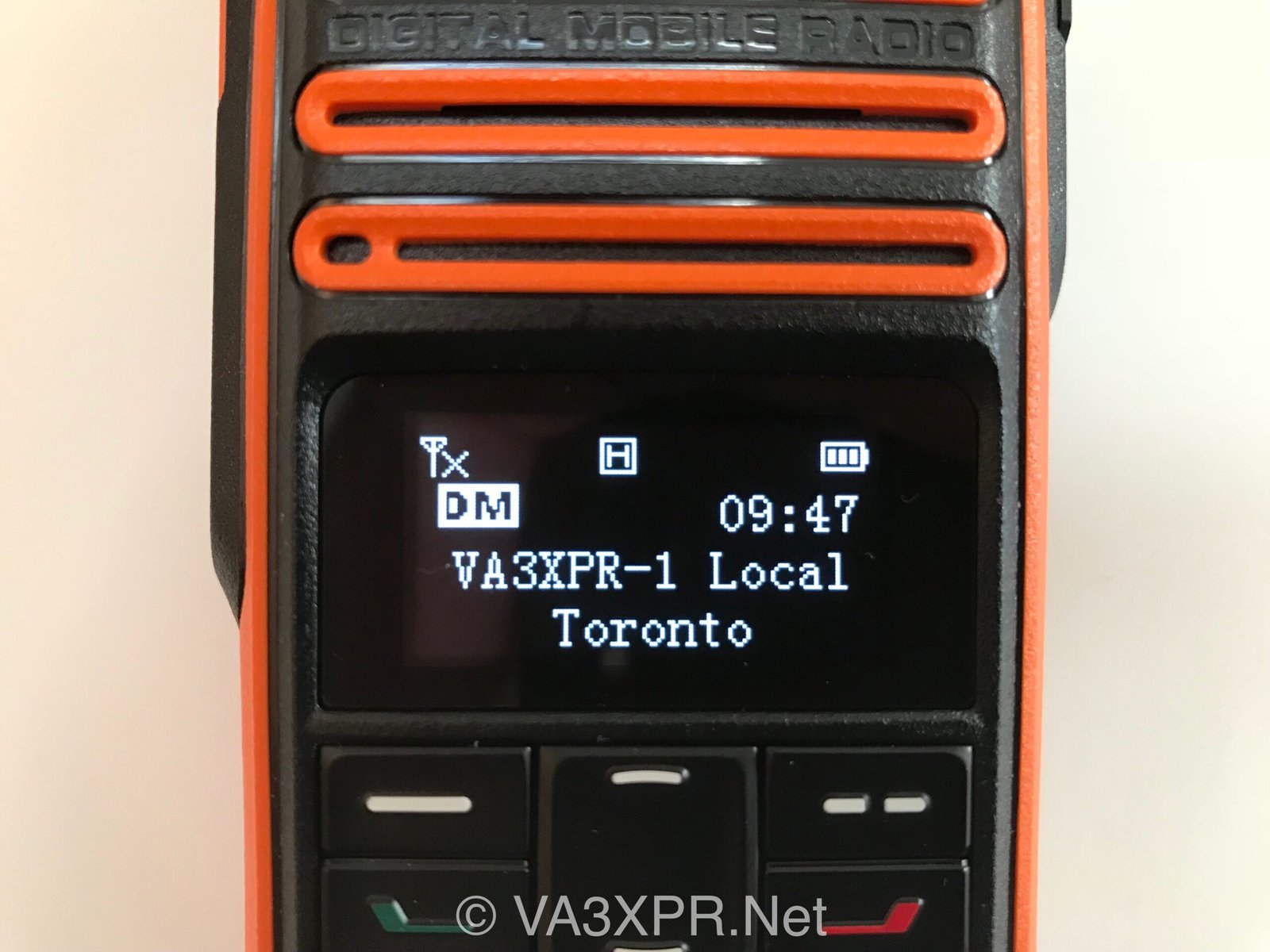 Hytera TD580 OLED display showing a ham radio repeater channel on the handheld DMR radio screen.