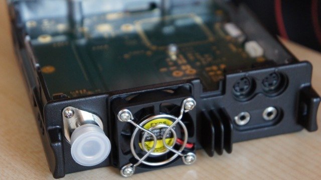 Rear view of the New Radio dual-band multimode mobile ham radio showing antenna and connectivity ports