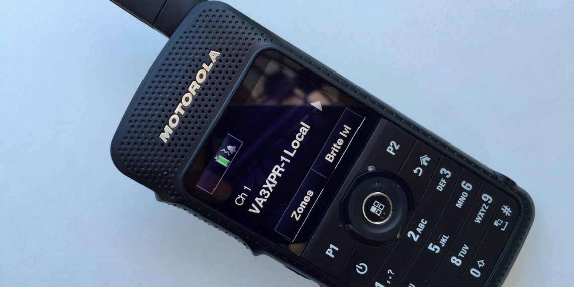 Motorola SL7550 UHF DMR handheld radio showing colour LCD screen and keypad layout