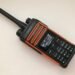 Hytera TD580 review - rugged orange-and-black DMR handheld radio with display and keypad.