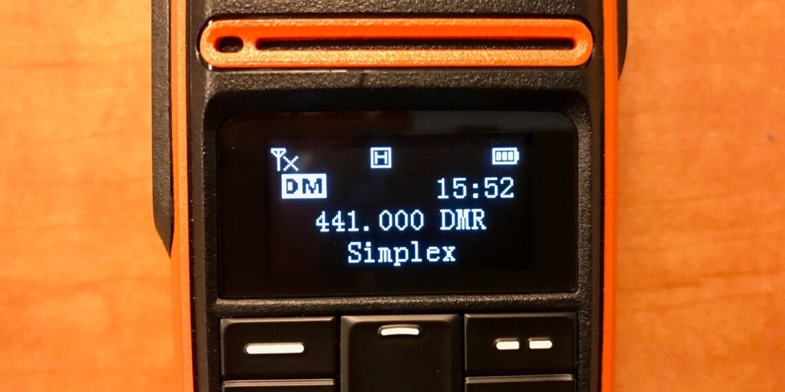 Hytera TD580 DMR handheld radio showing 441.000 MHz DMR simplex frequency on its display for ham radio use.