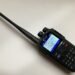 Connect Systems CS580 DMR handheld radio showing colour display and keypad layout.