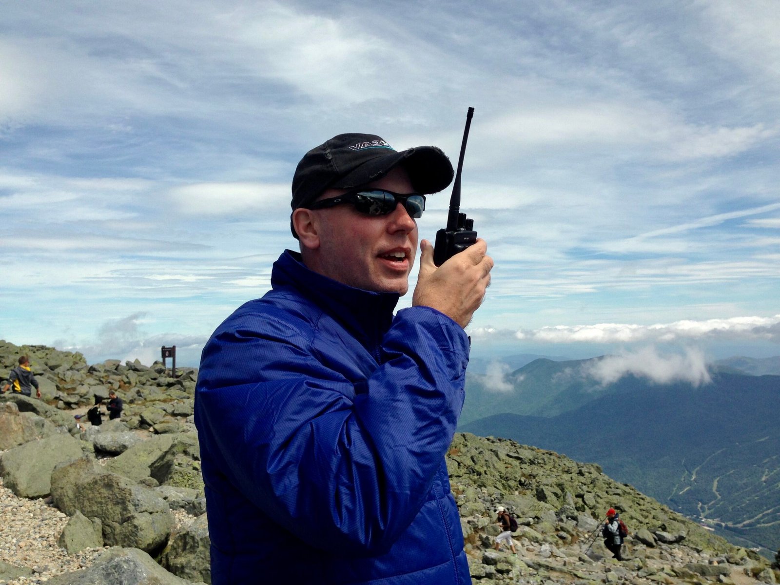 DMR for Beginners - Don Trynor from EvoHam.com operating a handheld DMR radio during a QSO on the summit of Mount Washington, New Hampshire
