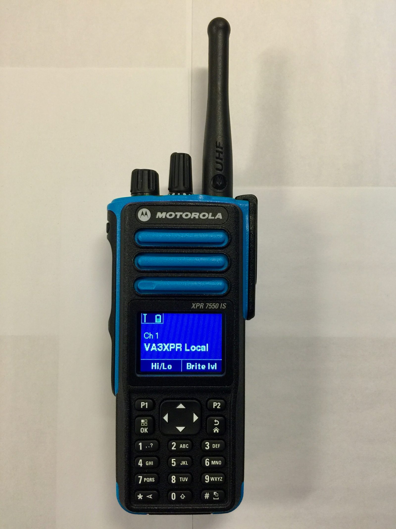 Motorola XPR7550 IS handheld radio front view showing blue Intrinsically Safe housing and colour display