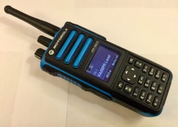 Motorola XPR7550 IS DMR handheld radio showing blue Intrinsically Safe housing and colour LCD display