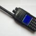 TYT MD-380 DMR handheld radio showing its colour LCD display and keypad.