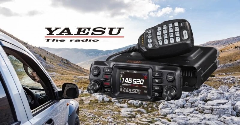 Fusion for Beginners - Yaesu FTM-200DE mobile radio with microphone shown in an outdoor operating environment.
