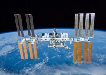 International Space Station orbiting above Earth at sunrise, illustrating the context for the ISS digital voice discussion. Photo by ESA.